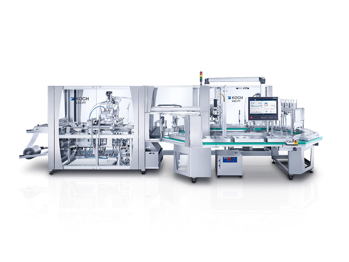KOCH KBS-PT blister machine with film roll, signal light, touchscreen and octagonal pallet table