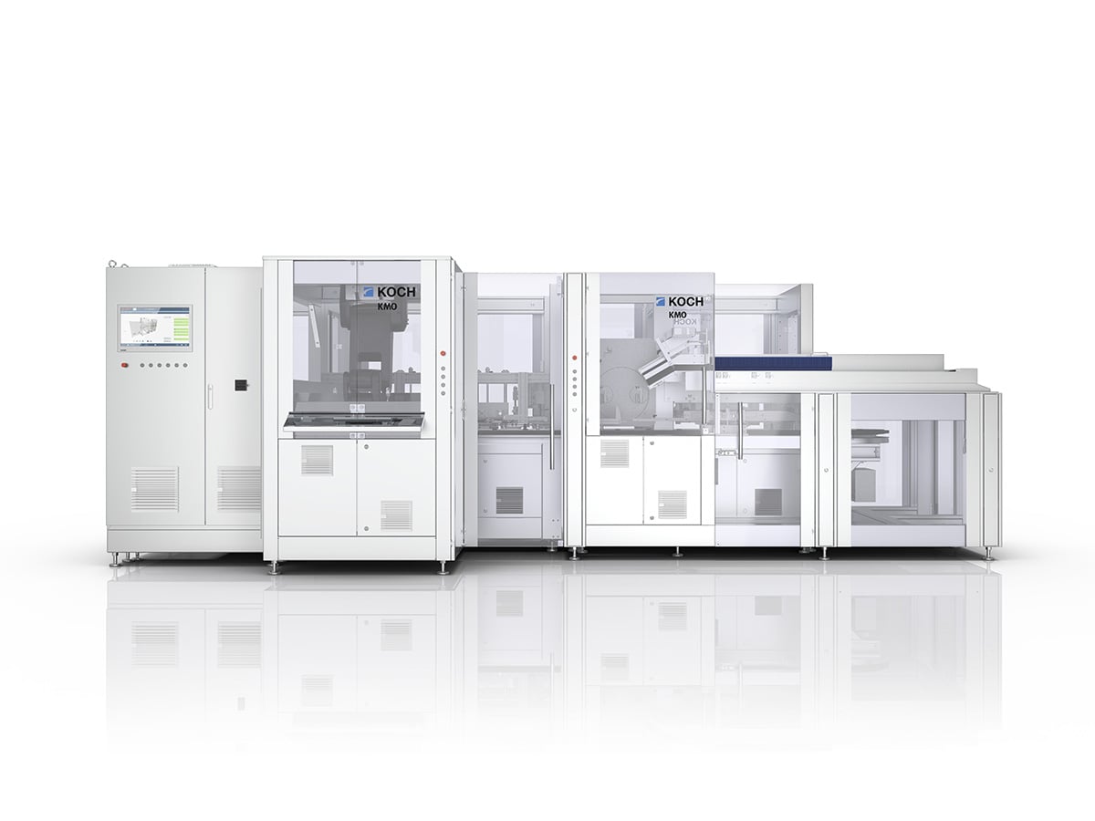KMO modular machine seen head-on, control cabinet with touchscreen and glazed process modules in a row
