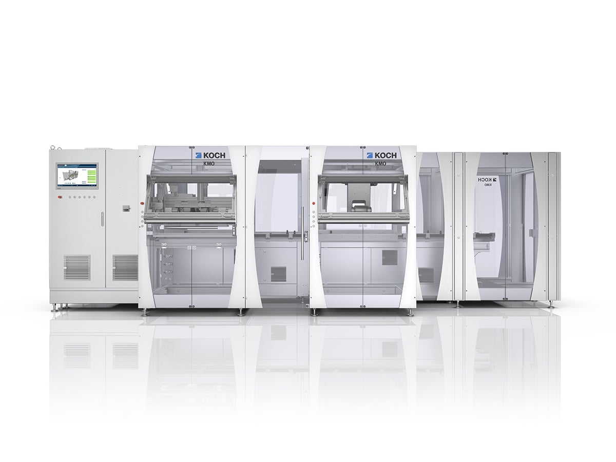 KMO modular packaging line with visible process stations in a frontal view