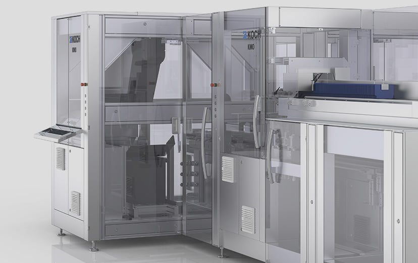 Close-up of two KMO modules with transparent doors, showing the internal handling components