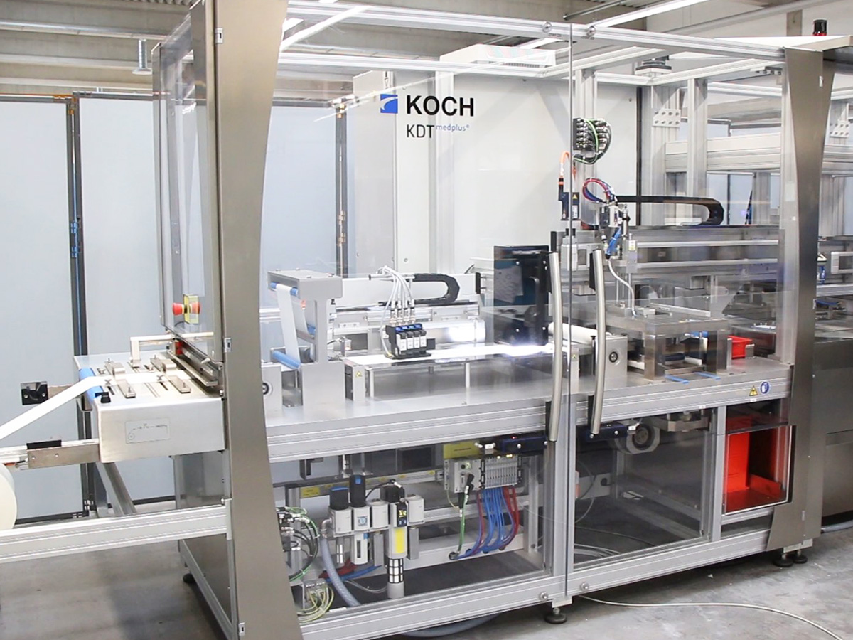 KOCH KDT medplus sealing machine with film reel and transparent guard doors