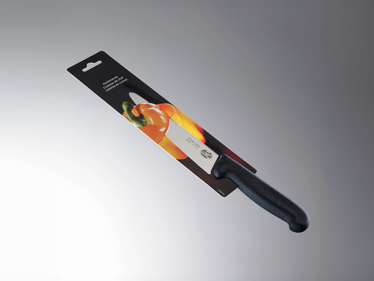 Kitchen knife in a Nurpak® card packaging with printed product imagery, introduced by KOCH Pac-Systeme in 1988